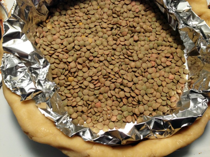 I ran out of dried beans, so I just used a bag of lentils I had lying around. They worked perfectly well!
