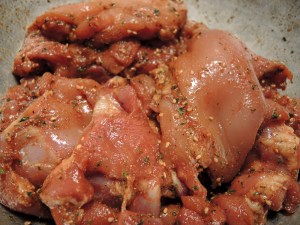 Smokey Spices Mixed with Raw Boneless Chicken Thighs for Sliders