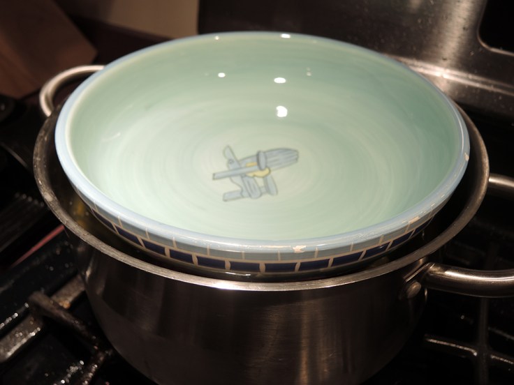 Grape Leaves Pressed Down by Bowl