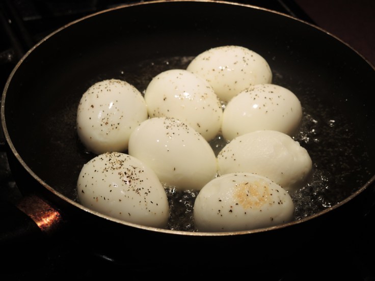 Hard Boiled Eggs in Frying in Oil