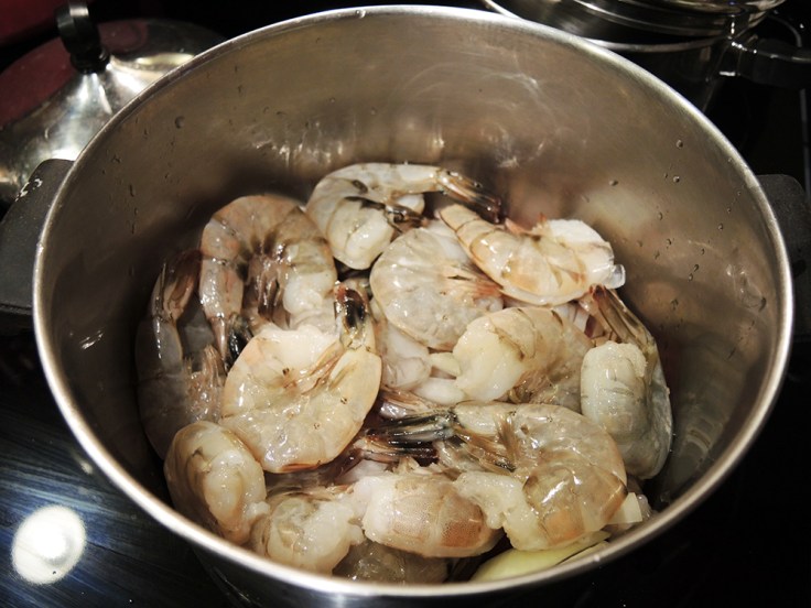 Shrimp Resting on Onion and Tomato