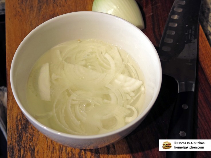 Home Is A Kitchen - Thinly Sliced Onions Soaking in Water