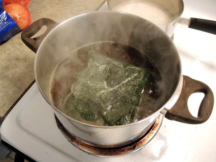 Home Is A Kitchen - Frozen Molokhia Added to Broth